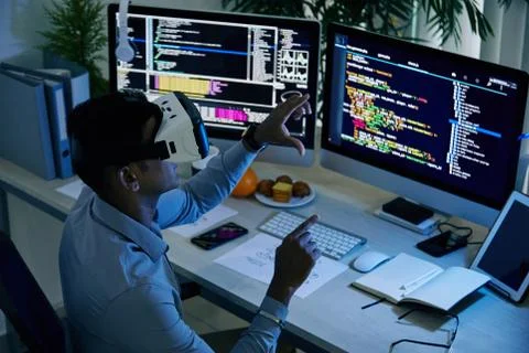 Programmer testing VR app Stock Photos