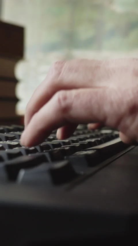 Programmer Types Continuously on Keyboard During Focused Coding Session Stock-Footage 337451927