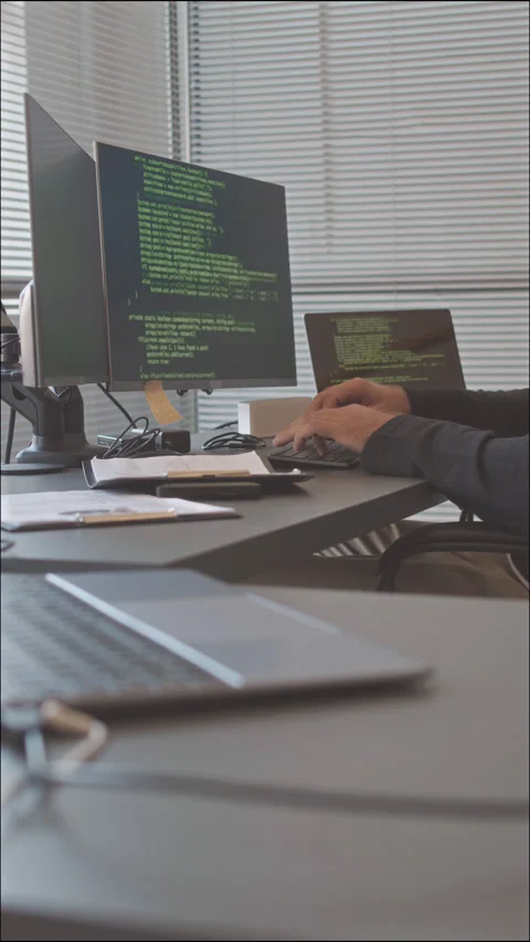 Programmer Typing Code on Desktop Computer Video stock 224028166