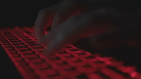 Programmer typing code on laptop at night Stock Footage 113785271