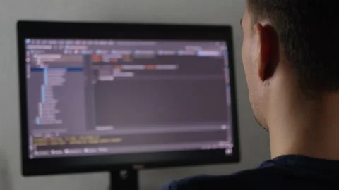 Programmer is typing code or typing an application Stock Footage 154367437