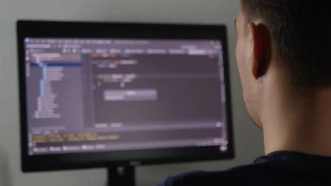 Programmer is typing code or typing an application Stock Footage 154367439