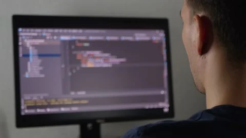 Programmer is typing code or typing an application Stock Footage 154367509