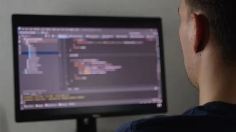 Programmer is typing code or typing an application Stock Footage 154367529
