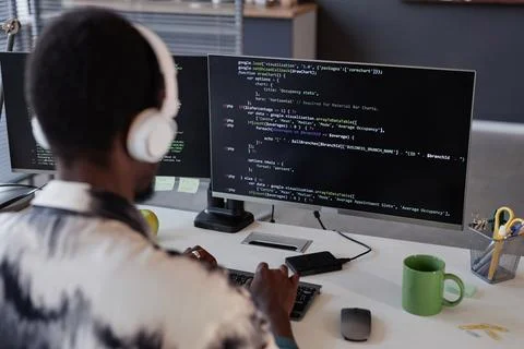 Programmer typing codes on computer in office Stock Photos