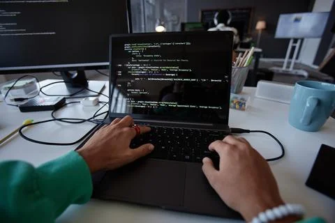 Programmer typing codes on laptop Stock Photos