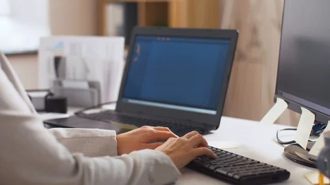 Programmer typing on computer keyboard at office Stock Footage 105031436