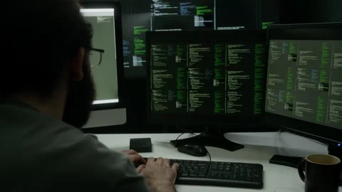 Programmer Typing on Computer Keyboard, Working on Code in Dimly Lit workspace Stock Footage 302195816