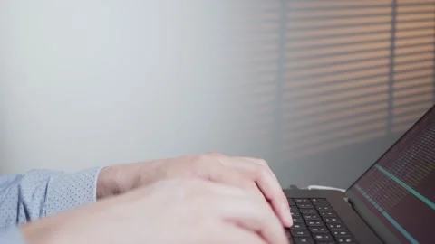 Programmer typing data code, working on project. Terminal with coding language Stockbeeldmateriaal 188177654