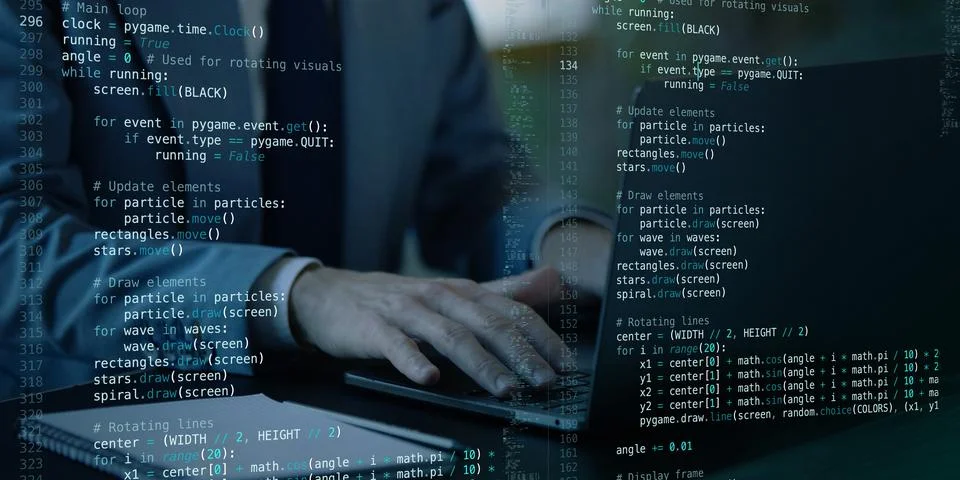 Programmer typing on laptop with transparent virtual screen displaying fictional Stock Photos