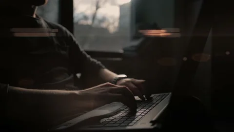 A programmer is typing new lines of HTML code. Laptop closeup. Working time. Web Stock Footage 218631405