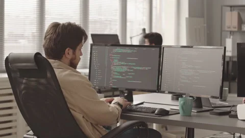 Programmer Typing Program Code on Computer Stock Footage 172191320