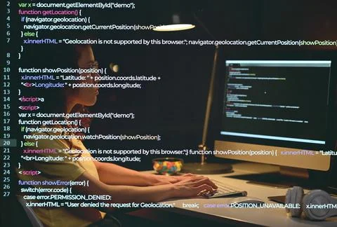 Programmer typing security codes on computer Stock Photos