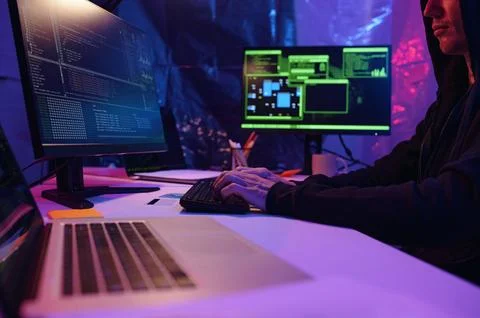 Programmer Typing Security Codes On Computer Stock Photos