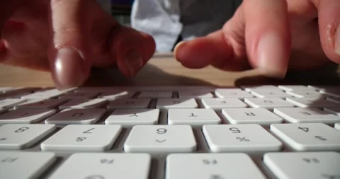 Programmer typing text on computer keyboard Stock Footage 258329510