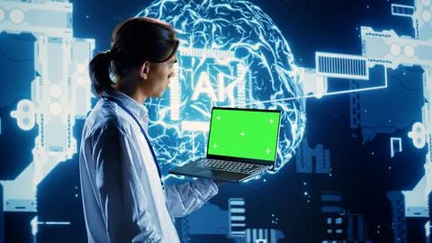 Programmer uses chroma key laptop for AI Stock Photos