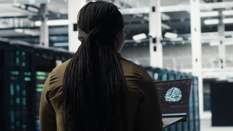 Programmer using artificial intelligence in data center to optimize network Stock Footage 317125788