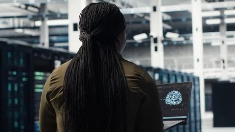 Programmer using artificial intelligence in data center to optimize network Stock Photos