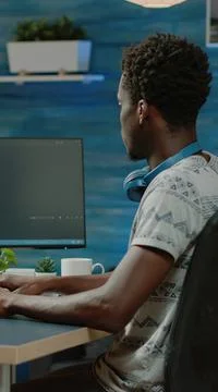 Programmer using binary code for website interface development 写真素材