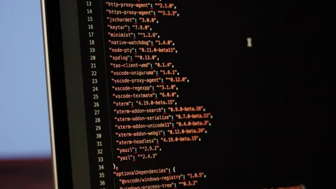 Programmer using laptop. Program code and script data on the screen close-up Video stock 194144709