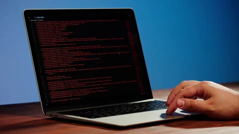Programmer using laptop. Program code and script data on the screen close-up Video stock 194515564