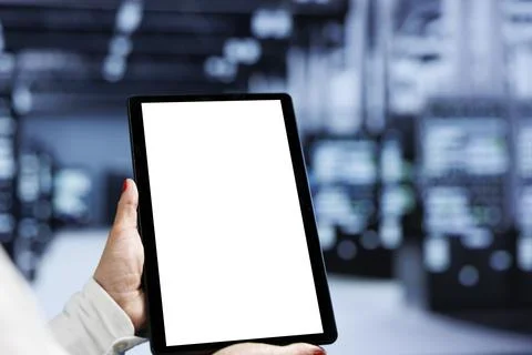 Programmer using tablet in data center Foto stock