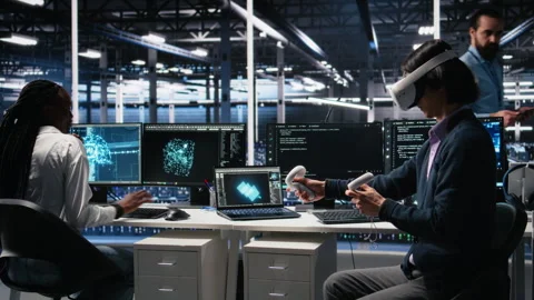 Programmer using VR goggles in data center, coding with generative AI Stock Footage 313570810