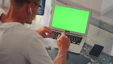 Programmer video calls about app design, with a tablet showing code. Video stock 296223697