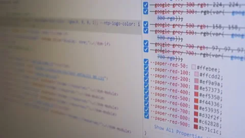Programmer Views the HTML Code of the Page on a Screen of a Computer Monitor. 4K Stock Footage 217720278