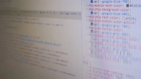 Programmer Views the HTML Code of the Page on a Screen of a Computer Monitor. 4K Stock Footage 217744630