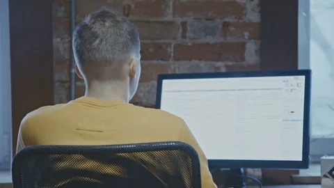 Programmer At Wok Stock Footage 76385786