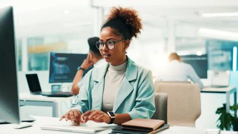 Programmer, woman and typing on computer in office for software development Stock Photos