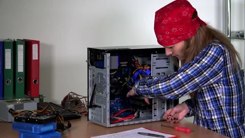 Programmer woman check computer in office cabinet. 4k Stock Footage 141894979