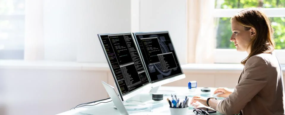 Programmer Woman Coding On Computer 写真素材