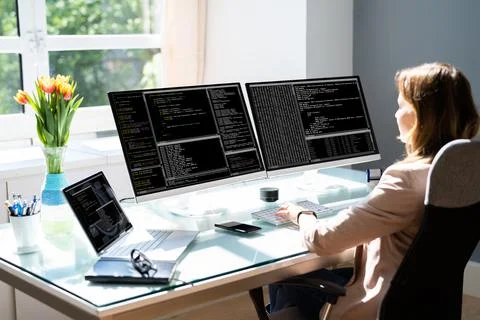 Programmer Woman Coding On Computer Stock Photos