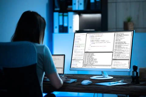 Programmer Woman Coding On Computer Stock Photos
