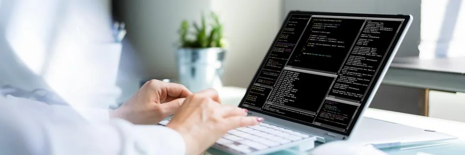 Programmer Woman Coding. Girl Coder Stock-Fotos