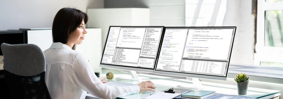Programmer Woman Coding Program On Computer Stock Photos