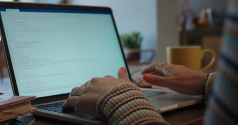 Programmer woman hands using laptop computer typing programming code software Stock Footage 138398937