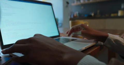 Programmer woman hands using laptop computer typing programming code software Stock Footage 138398949