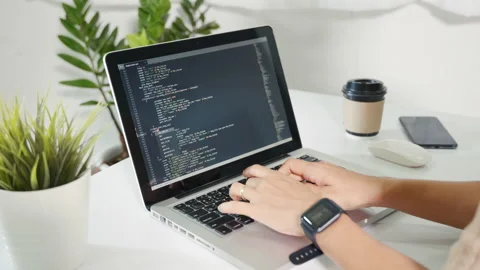 Programmer woman writing program HTML code sitting at workplace in office Stock Footage 203862064