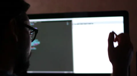 The programmer at work. The code of the website on the computer monitor. Stock Footage 68728751