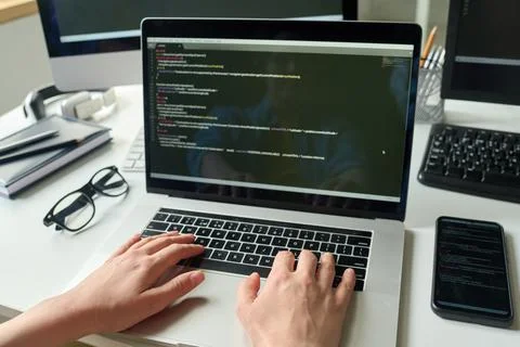 Programmer working on brand new code Stock Photos