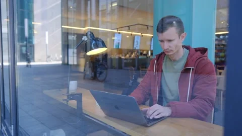 Programmer Is Working In Cafe On Laptop Video Stock Footage 278913897