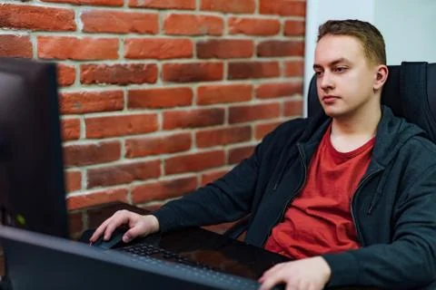 Programmer working on the computer at developing programming on background Stock-Fotos