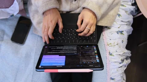 Programmer working on computer at home Stock Footage 232716527