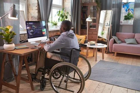 Programmer working on computer at home 스톡 사진