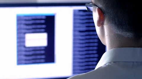 Programmer working with data and codes on the computer Stock Footage 72467435
