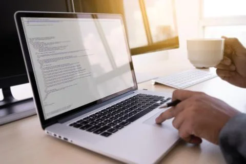Programmer working Developing programming technologies Web Design Online Tech Stock Photos