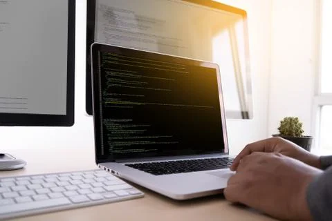 Programmer working Developing programming technologies Web Design Online Tech Stock Photos